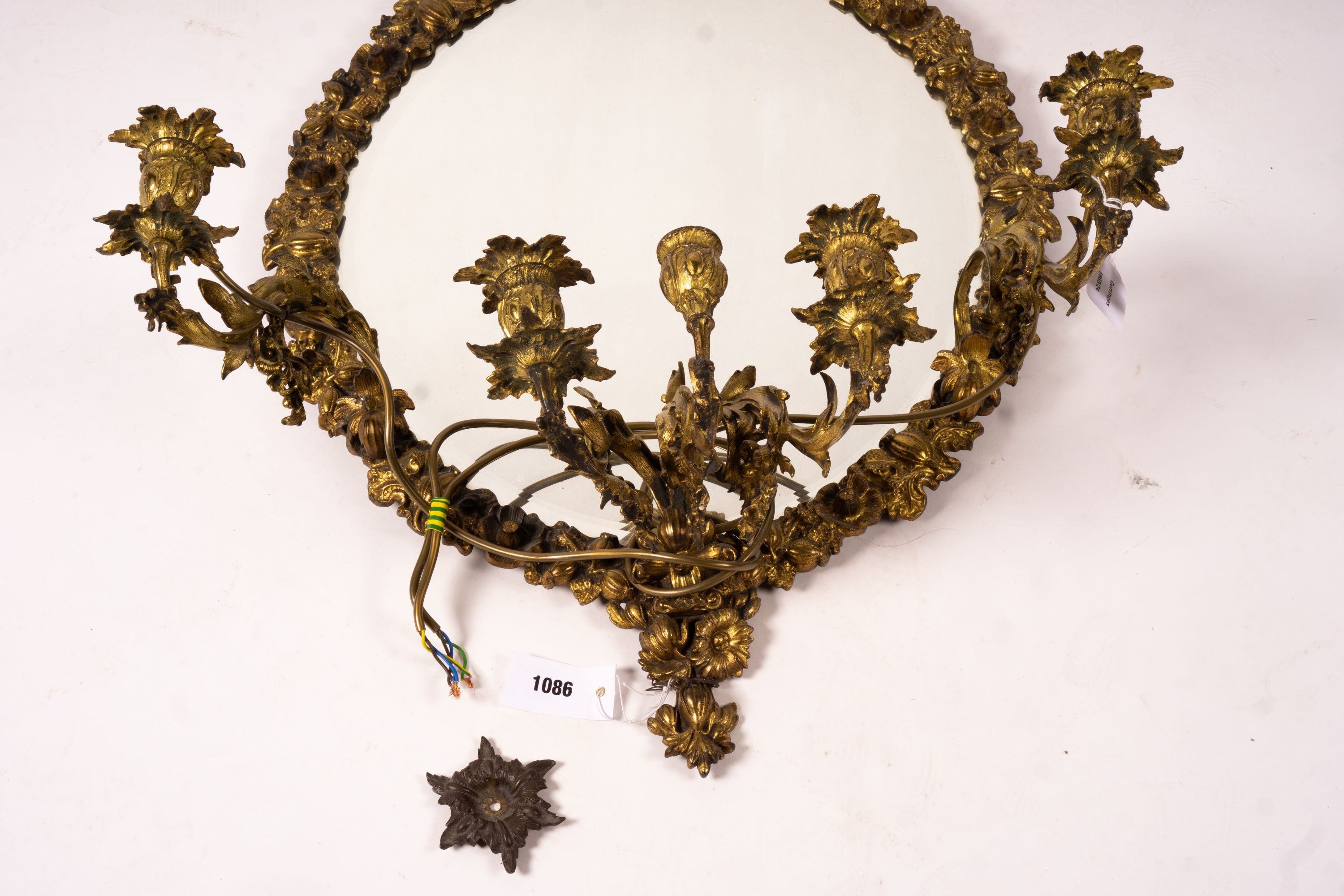 A late 19th century brass five branch girondole, width 64cm, height 84cm